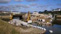 Building the temporary causeway within the Site of Special Scientific Interest Building the temporary causeway within the Site of Special Scientific Interest